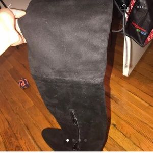Woman’s thigh high boot